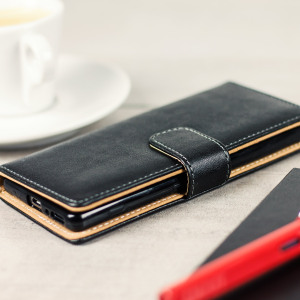 Protect your Sony Xperia XA with this durable and stylish black leather-style wallet case from Olixar. With luxurious tan lining and slots for your most important cards and documents. Leave the regular wallet at home.