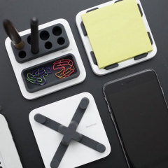 The MThings Smartphone Stand & Desktop Organiser consolidates the space on your cluttered desk, offering a holder for your phone as well as an elegant, convenient way to store office equipment like writing stationery and sticky notes.